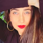 A photo of Karisma Kapoor, a Actress, who has a Soft Summer color profile.